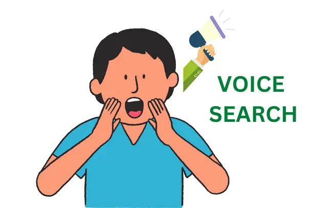 alt="A man trying to use the voice search feature on google"